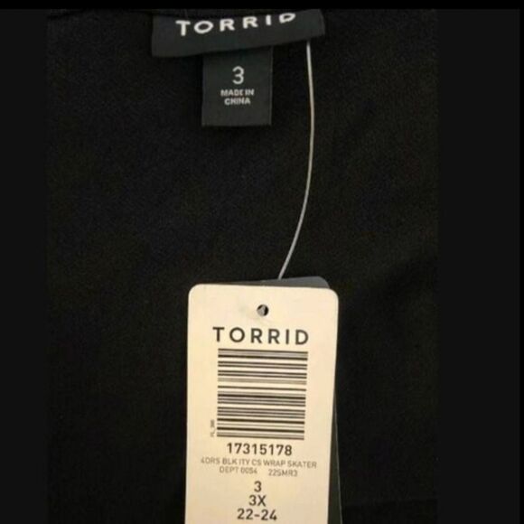 TORRID PLUS Size Black Mini Studio knit Cold Shoulder Wrap Dress. - Picture 10 of 13